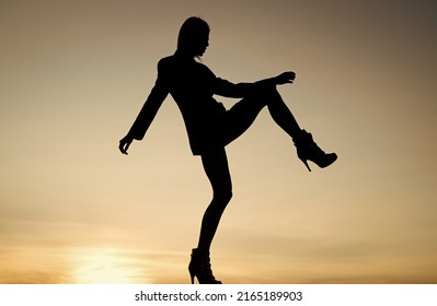 Get up and get moving. Dance girl. Girl silhouette on evening sky. Female performer