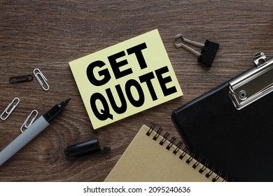 GET QUOTE. blank yellow sticker on the table. business concept - Shutterstock ID 2095240636