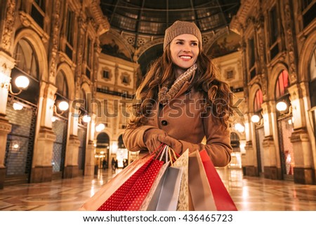 Similar – Image, Stock Photo A woman iis looking at her smartphone outdoors.