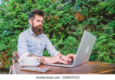 Getting Access To An Online Education. University Student Studying Online. Adult Learner Training Through Online Courses Or Webinar. Bearded Man Shopping Online Outdoor.