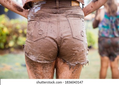 Getting Dirty In A Mud Puddle, Cut Off Jeans Dripping Wet