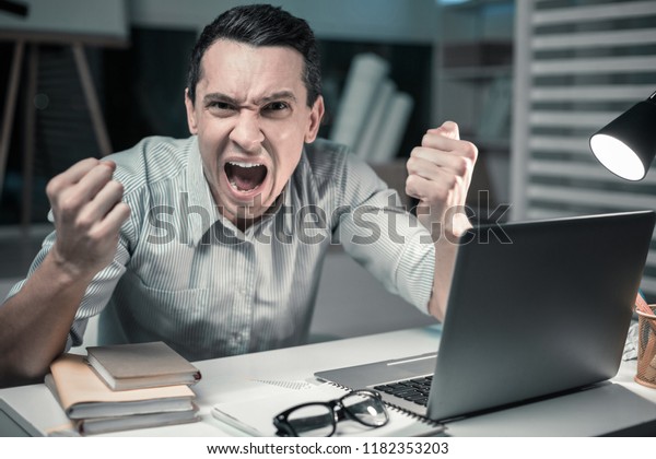 Getting Mad Furious Young Man Clenching Stock Photo (Edit Now) 1182353203