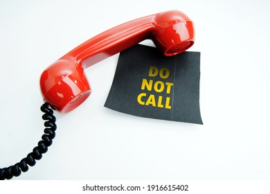 Getting On The Do Not Call List, Retro Red Phone Handset With A Black Sticky Note And Text Do Not Call