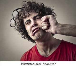 Getting punched in the face - Shutterstock ID 429351967