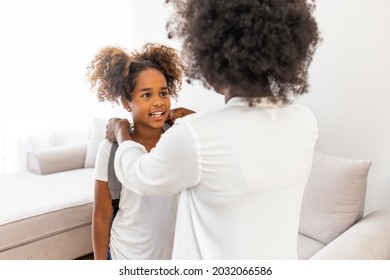  Getting Ready For School. Loving Mom Sends Adorable Daughter Off To School. First Day At School. Mother Leads Little Child Girl In First Grade. Mother Preparing Her Child For School