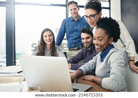 Getting some positive feedback. Cropped shot of a group of businesspeople meeting in the boardroom.