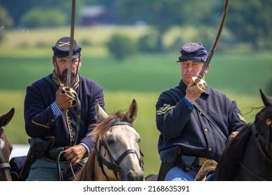 GETTYSBURG, PENNSYLVANIA - AUGUST 09, 2015: Cavalry corps union soldiers reenact the Battle of Gettysburg. The battle was fought by Union and Confederate forces during the American Civil War.