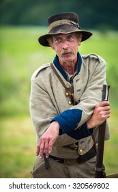 GETTYSBURG, PENNSYLVANIA - AUGUST 09, 2015: Confederate soldier reenacts the Battle of Gettysburg. The  battle was fought by Union and Confederate forces during the American Civil War.