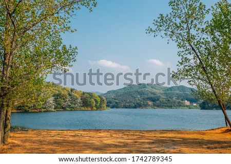 Geumgwang Lake with mountains in Anseong, Korea