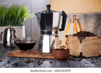 geyser coffee maker and aromatic coffee. The process of making coffee in a geyser coffee maker. close-up. selective focus.
