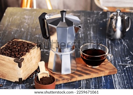 geyser coffee maker and aromatic coffee. The process of making coffee in a geyser coffee maker. close-up. selective focus.