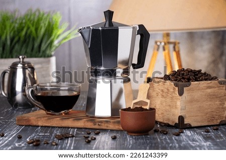 geyser coffee maker and aromatic coffee. The process of making coffee in a geyser coffee maker. close-up. selective focus.