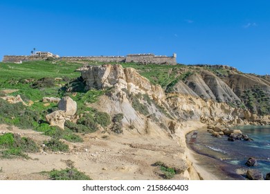 GHAJNSIELEM GOZO, MALTA - Jan 03, 2022: Panoramic view of hills and Fort Chambray, in Gozo, Malta, fortress built by Order of St John to protect the coastline at Xatt l-Ahmar, Ghajnsielem