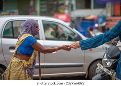 Ghaziabad, Uttar Pradesh, India-Aug 22 2021: Indian Women Beggar On Street, Begging Money,