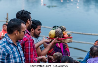 Ghaziabad, Uttar Pradesh/India - November 2019 : Indian Hindu Devotees Enjoying The Chhath Puja Festival With Family On The River Bank Of Hindon