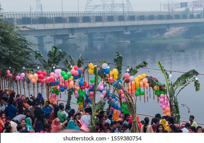 Ghaziabad, Uttar Pradesh/India - November 2019 : Indian Hindu Devotees Enjoying The Chhath Puja Festival With Family On The River Bank Of Hindon