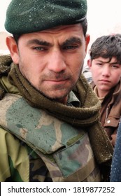 GHAZNI, AFGHANISTAN - FEBRUARY 2011: Afghan National Army Soldier Looks On Intensely During A Dismounted Patrol.