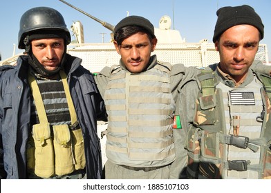 GHAZNI, AFGHANISTAN - November 12, 2010: Afghan National Police Officers In Body Armor Pose For A Photo Before A Combined Combat Operation With US And Polish Soldiers Of ISAF's Task Force White Eagle.