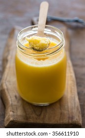 Ghee - clarified butter - in a glass jar