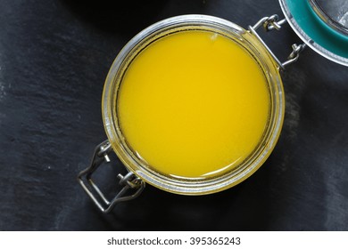 Ghee Or Clarified Butter In An Open Jar Top Down View