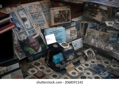 Ghent, Belgium - October 31 2021: Numismatics And Filatelie Store Window With A Picture Of The Belgian King, Philippe