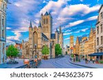 Ghent city historical center with Saint Nicholas Church on Korenmarkt Wheat Market square, Belfry Het Belfort van Gent and row of colorful buildings, East Flanders province, Flemish Region, Belgium