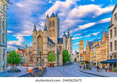 Ghent city historical center with Saint Nicholas Church on Korenmarkt Wheat Market square, Belfry Het Belfort van Gent and row of colorful buildings, East Flanders province, Flemish Region, Belgium