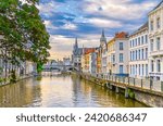 Ghent cityscape, promenade of Lys river with Saint Michael