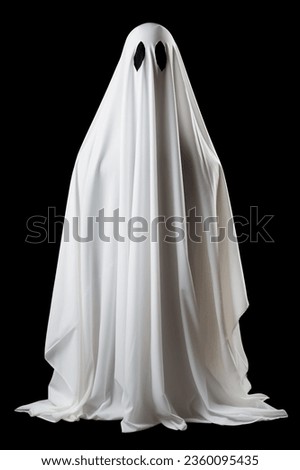 Ghost costume made from a white sheet on a black background. Halloween party outfit.