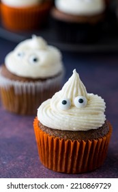 A Ghost Pumpkin Spice Cupcake With Cute Eyeballs.