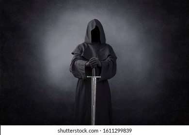 Ghostly figure with medieval sword in the dark