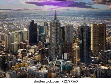Ghostly purple cloud forms over city skyscraper. Collins Street Melbourne. 3rd and 4th tallest buildings in Australia heavily influenced by Art Deco buildings in New York