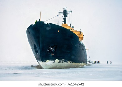 Giant Black Ice Breaker Ship,in The Ice Cold Water Of The North Ocean