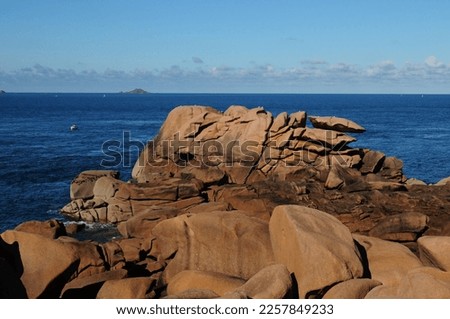 Giant Boulders On The Beautiful Red Rock Coast In Ploumanach In Bretagne France On A Beautiful Sunny Summer Day With A Clear Blue Sky