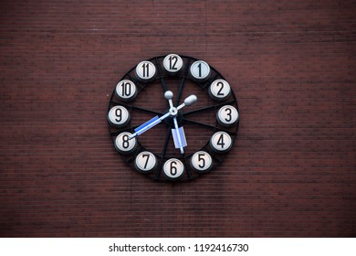 Giant Clock On The Brick Wall 