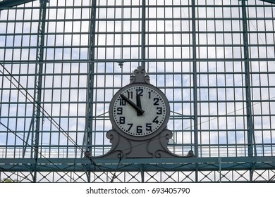 Giant clock in a train station, platform. time concept
