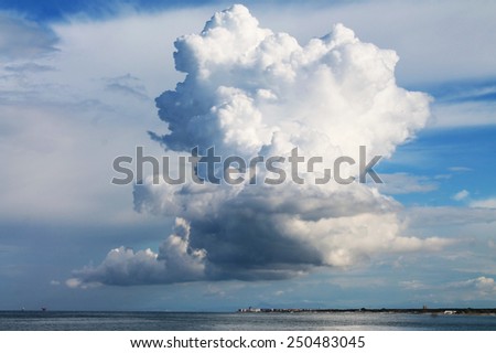giant clouds over the sea