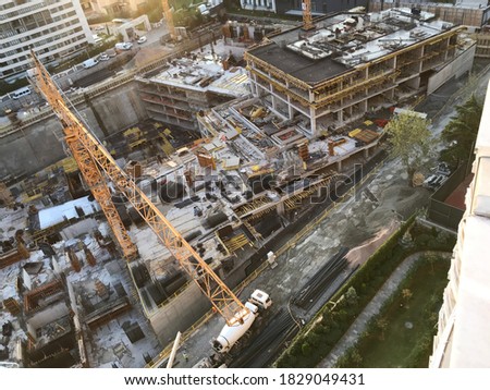 Giant Construction Building foundations laid technology industrial Aerial shot large project giant structures construction with iron conduction buying now.