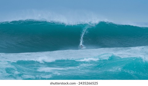 "Giant Cow" surf competition. Storm surge with big waves. Santander Municipality. Cantabrian Sea. Cantabria. Spain. Europe - Powered by Shutterstock