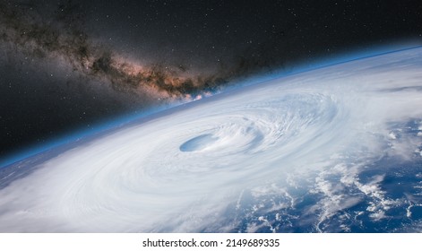Giant hurricane seen from the space with milky way galaxy at sunset 