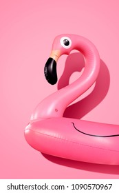 Giant inflatable Flamingo on a pink background, pool float party, trendy summer concept