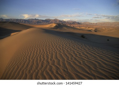 Giant Sand Dunes And The Kit Fox Hills Backed By The Funeral Mountains, Death Valley National Park, California.