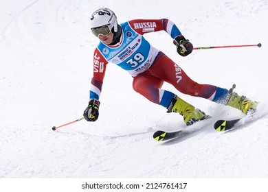 Giant slalom International Ski Federation FIS Cup, Russian Alpine Skiing Championship. Sverdlovsk mountain skier Popov Nikolay skiing down mount ski slope. Kamchatka Peninsula, Russia - April 1, 2019