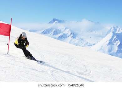 Giant Slalom Ski Racer Skiing Downhill In High Mountains, Solden, Austria