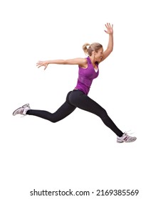 A Giant Step Towards Her Fitness Goals. Studio Shot Of A Woman Leaping Through The Air Across The Frame Isolated On White.