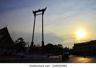 Giant Swing or Sao Chingcha religious structure front of Wat Suthat Thepphaararam for thai people foreign travelers travel visit and traffic road at Phra Nakhon on May 11, 2017 in Bangkok, Thailand.