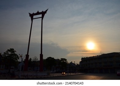 Giant Swing or Sao Chingcha religious structure front of Wat Suthat Thepphaararam for thai people foreign travelers travel visit and traffic road at Phra Nakhon on May 11, 2017 in Bangkok, Thailand.