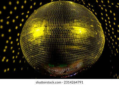 Giant Yellow disco ball in a club - Shutterstock ID 2314264791