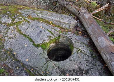 A giant's kettle, also known as either a giant's cauldron, or glacial pothole, is a typically large and cylindrical pothole drilled in solid rock underlying a glacier.
