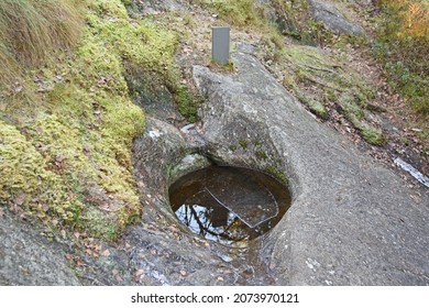 A giant's kettle, also known as either a giant's cauldron, is a typically large and cylindrical pothole drilled in solid rock underlying a glacier.